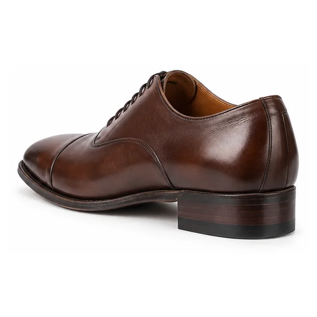 Formal shoe after professional heel replacement by My Shoe Clinic