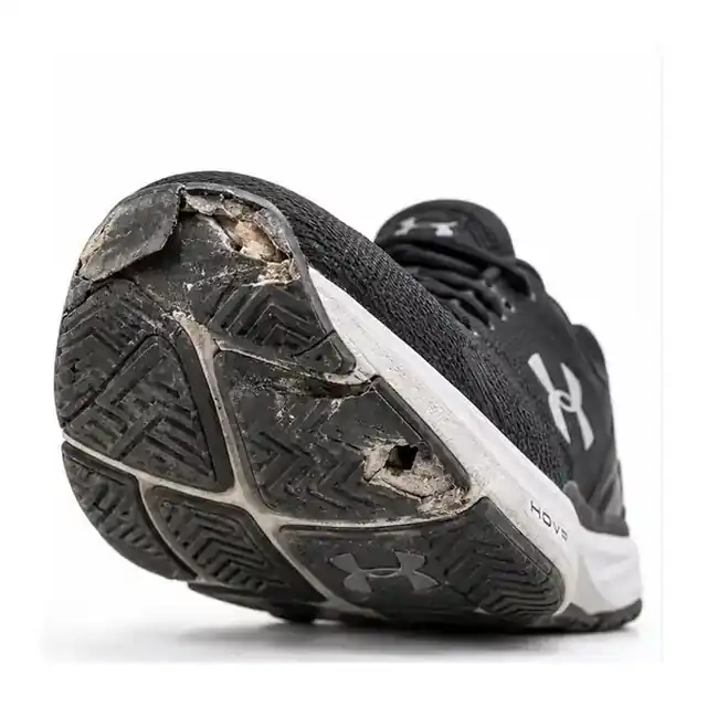 Sports shoe grip before professional repair