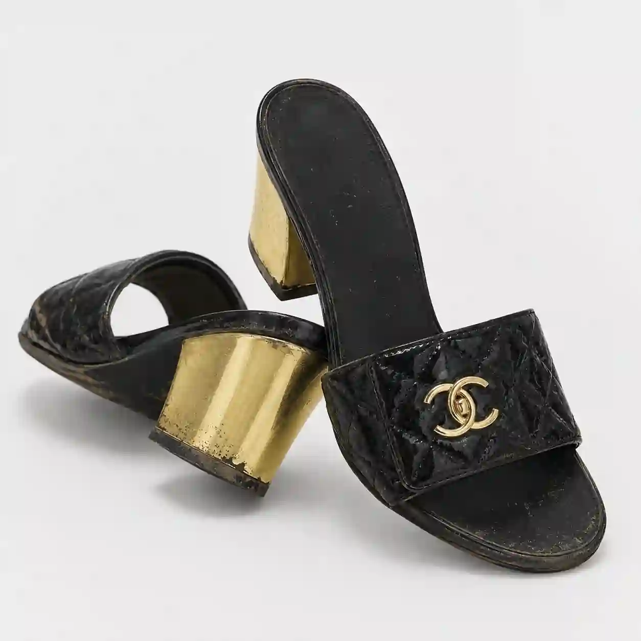 Sandal before heel and heel-tip repair